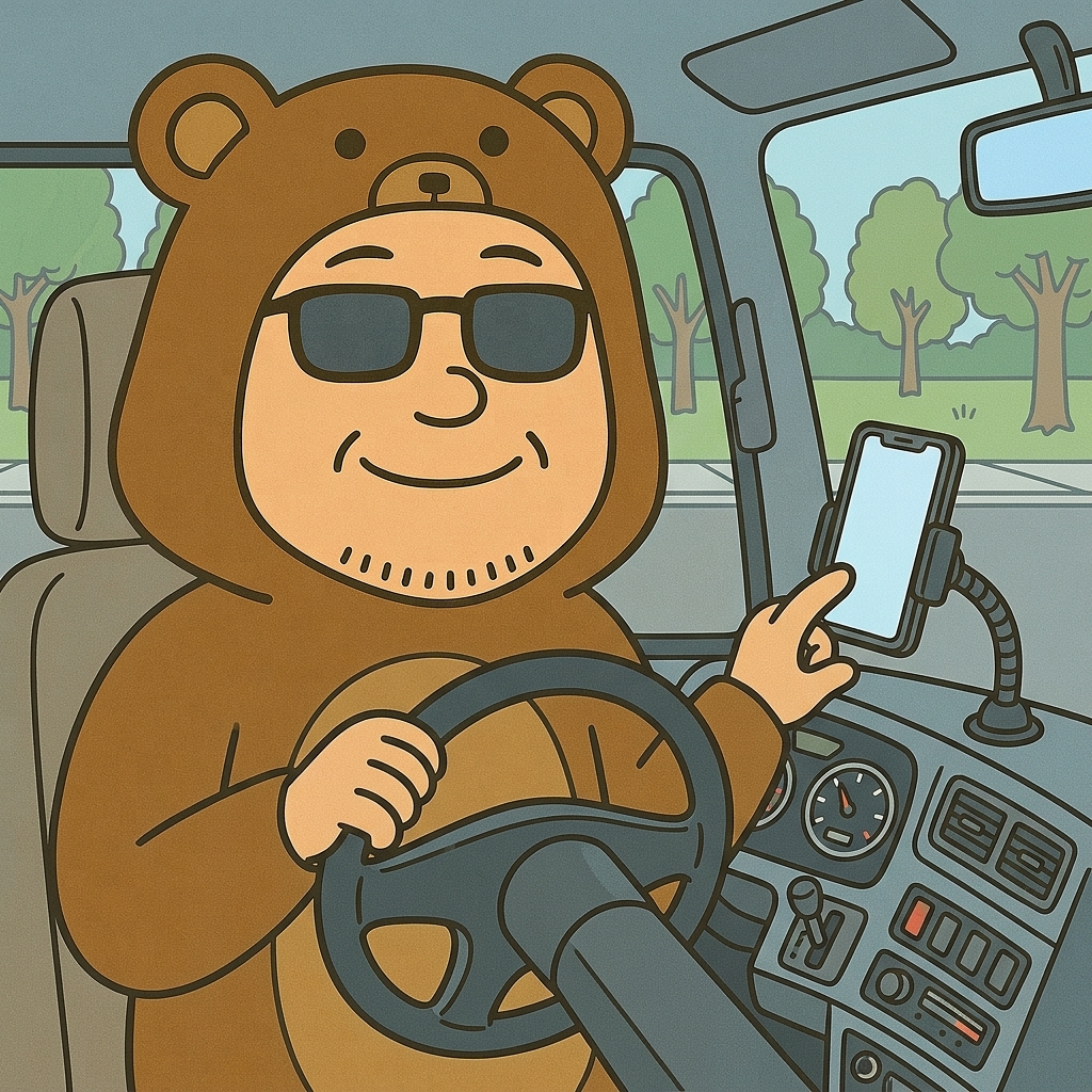 観光バスを運転しながらスマホをカーナビに使うくま旦那